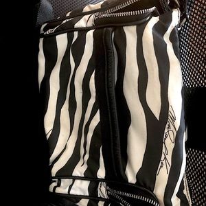 Michael Kors Camera Bag-black and white “Zebra” design. Great condition.